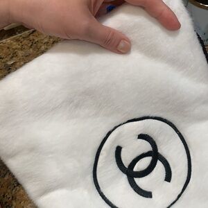 Absolutely adorable authentic rare,collectible white Chanel furry pouch/clutch.